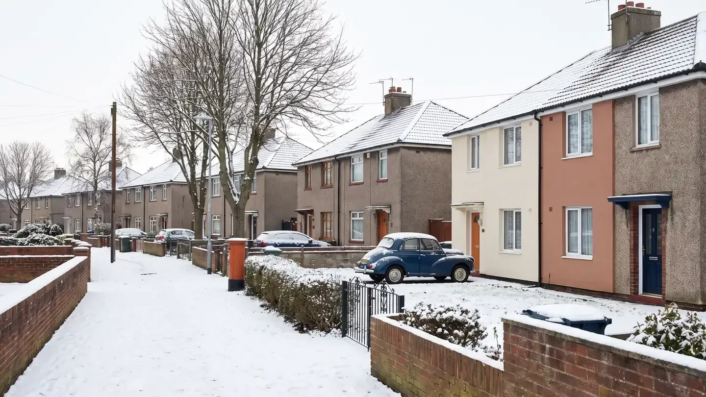 Street of semi-detached homes in England of the kind the Warm Homes: Local Grant upgrades